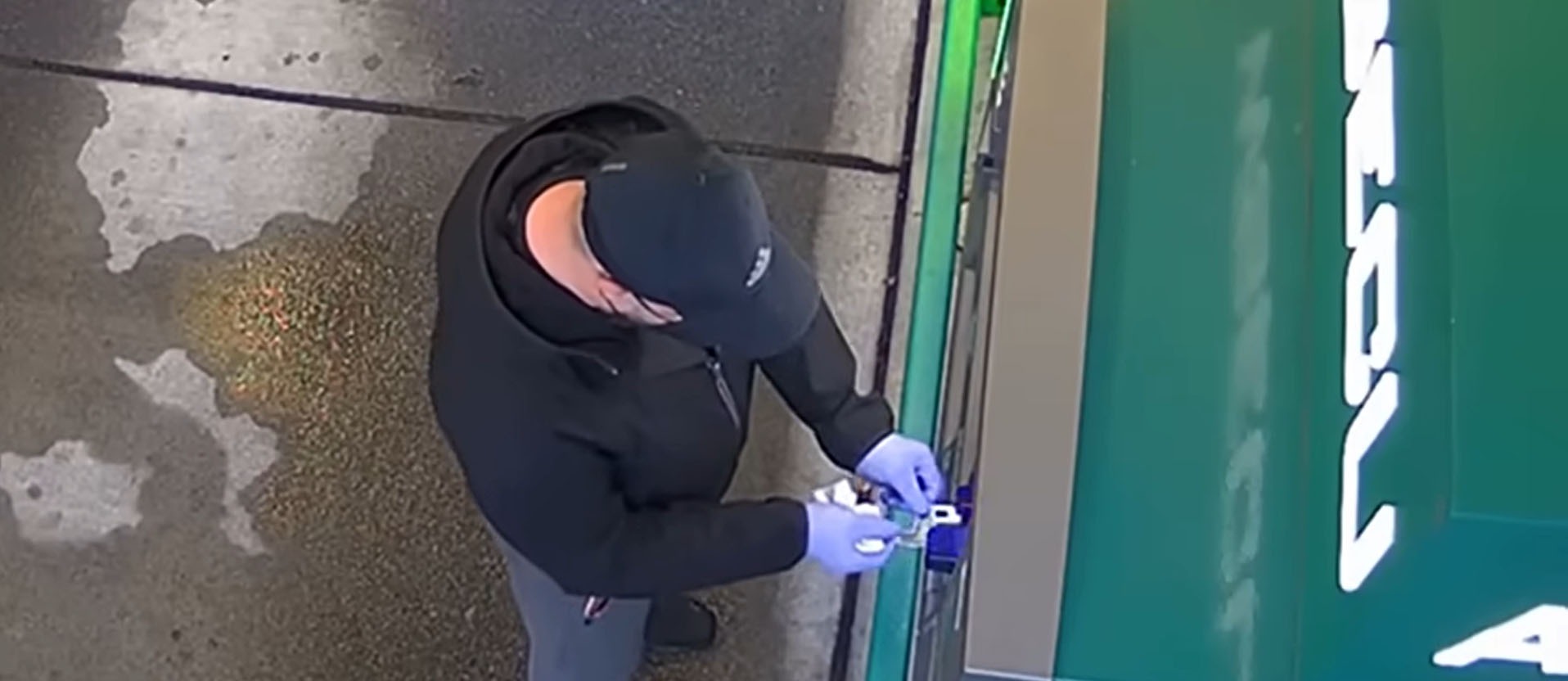 The scammer was caught on video installing the skimmer