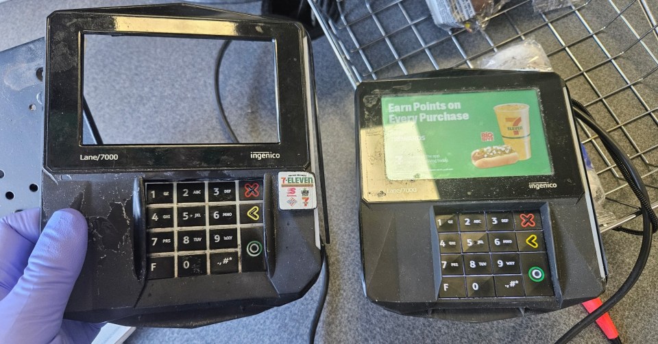 Two damaged Ingenico Lane/7000 payment terminals.
