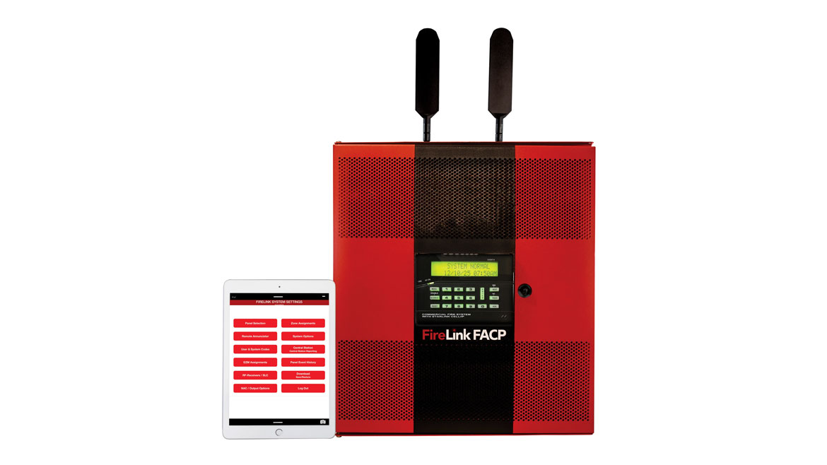 Red FireLink FACP with antennas next to a tablet displaying system settings for a fire alarm system.