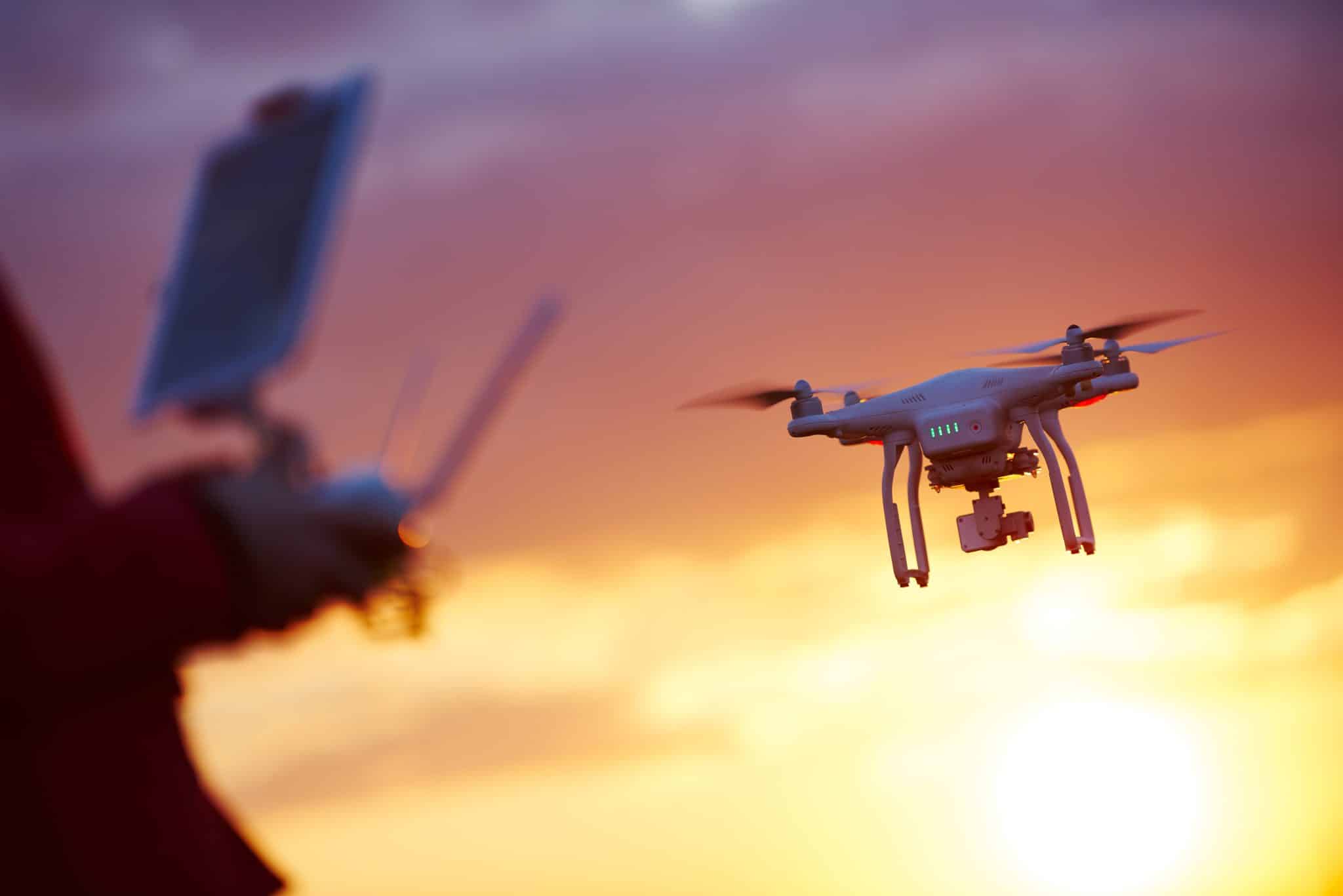 drone-and-operator-scaled.jpg